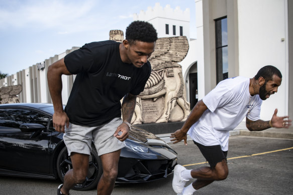 Jason Saab and fellow winger Josh Addo-Carr pose up for a mock sprint trial.