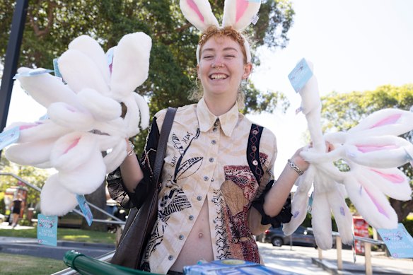 Sinead Connon has bought Easter eggs and 17 pairs of bunny ears for her friends who are going to a music festival over the Easter weekend. She shops in different stores looking for specials to counter the rising prices in Sydney.