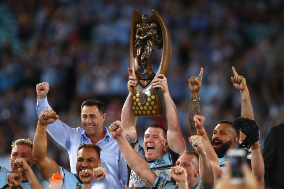 Paul Gallen hoists the Provan-Summons trophy aloft to end five decades of heartbreak for Sharks fans in 2016.