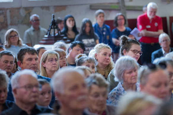 Mourners at the memorial service. 