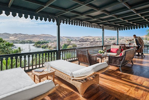 The style fuses Ottoman-style arches with Arabic mashrabiya woodwork.