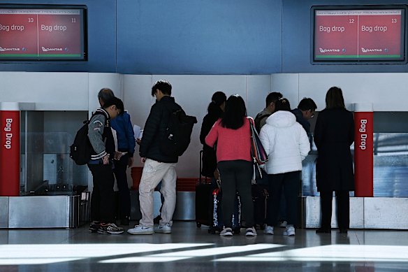 Passengers at Sydney airport last year.