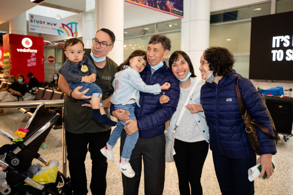 The Dwyer family finally reunintes with Ms Dwyer’s grandparents, Quy and Cu Nguyen who had flown to Australia from Vietnam via Singapore. 