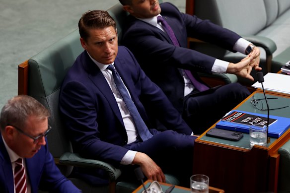 Andrew Hastie with a copy of the Sun Tzu classic Art of War in the House of Representatives in February.