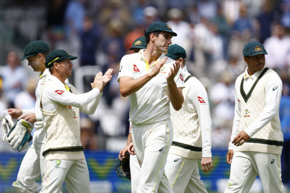 Pat Cummins leads the Australian team off the field at Lord’s.