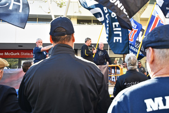 CFMEU WA state secretary Mick Buchan and MUA WA branch secretary Christy Cain speak to the crowd outside Labor Fremantle MLA Simone McGurk's office on Wednesday morning. 