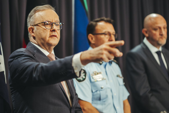 Prime Minister Anthony Albanese with head of ASIO Mike Burgess and AFP commissioner Reece Kershaw.