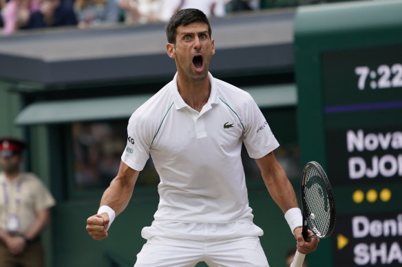 Novak Djokovic celebrates after defeating Denis Shapovalov during the men’s singles semi-finals.