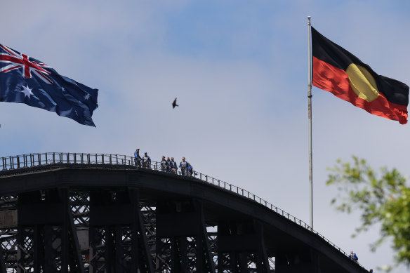 The Aboriginal flag will permanently replace the NSW flag atop the Sydney Harbour Bridge.