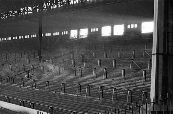 The Anfield Kop as it used to be: full of terracing.