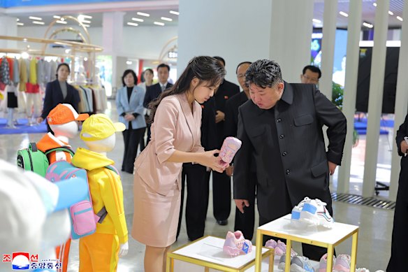 North Korean state media published images on Tuesday of leader Kim Jong-un and his daughter visiting a garment and footwear exhibition in Pyongyang.