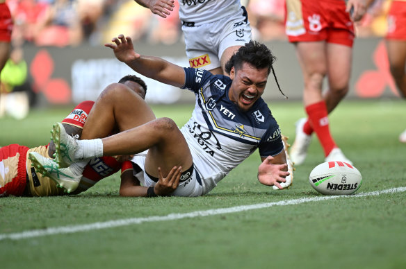 Jeremiah Nanai scores for the North Queensland Cowboys against the Dolphins.