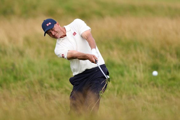 Adam Scott plays a shot on the 12th hole.