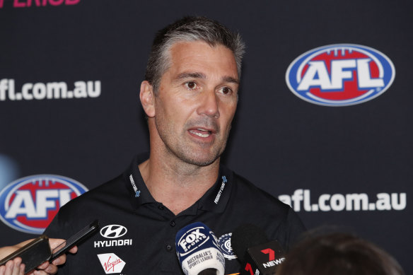 Steve Silvagni speaks to media during AFL trade period in October. 