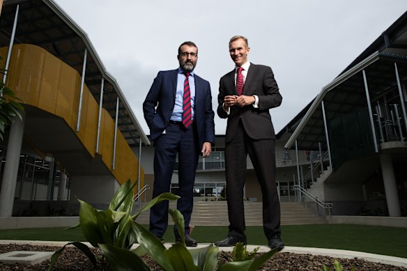 Former education minister Rob Stokes and then head of School Infrastructure Anthony Manning at North Kellyville Public School in 2018.
