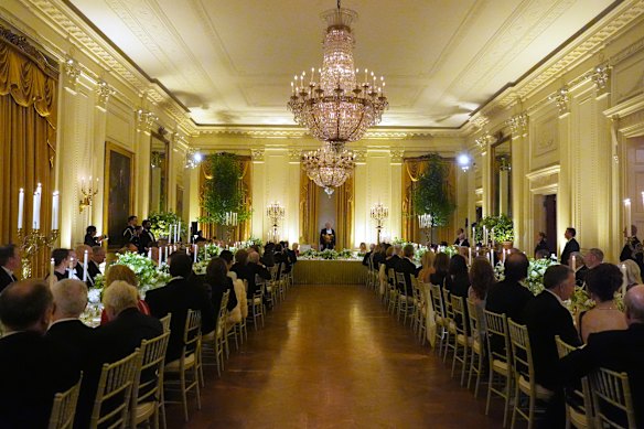 The scene of the opulent dinner in the White House’s East Room.