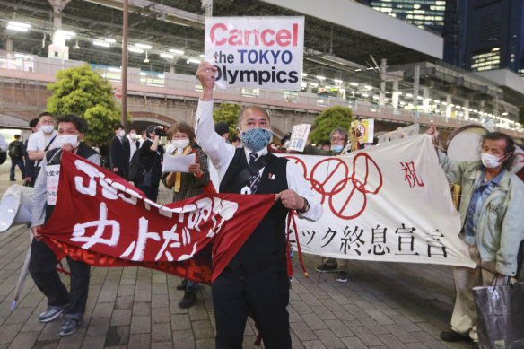 Demonstrators in Tokyo protest against the Games being held in Japan.