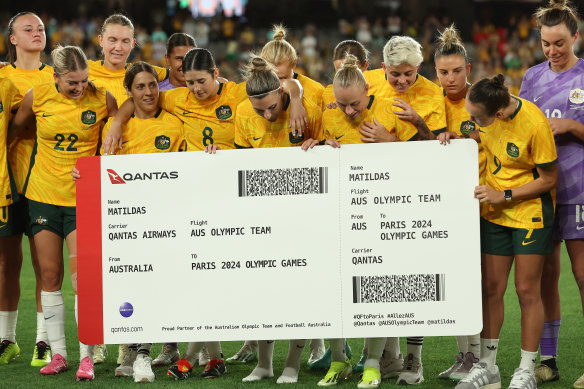 Ticket to Paris: The Matildas celebrate.