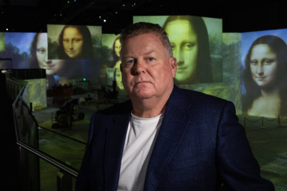 Lume owner Bruce Peterson inside Leonardo da Vinci: 500 Years of Genius.