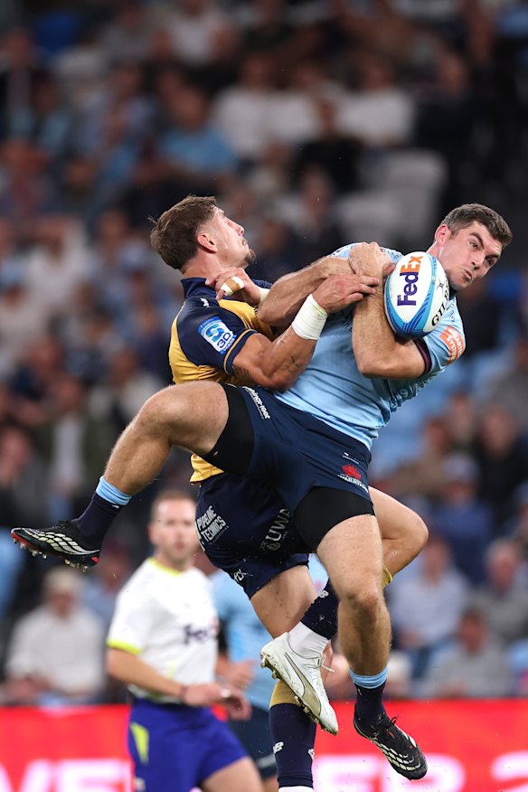 Waratahs' Lawson Creighton did a great job neutralizing Zac Lomax's influence in the air.