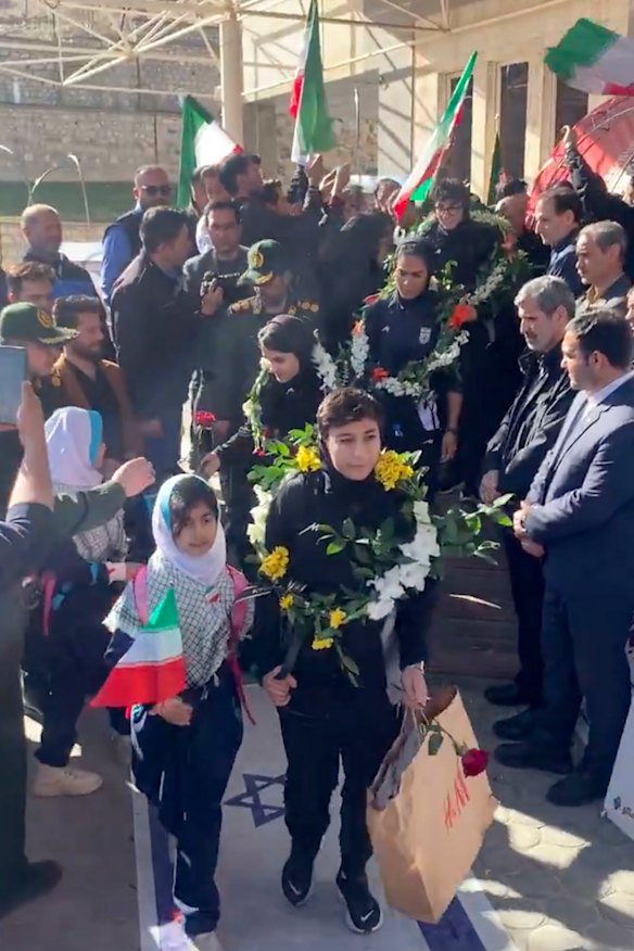 The Iranian women’s soccer team arriving home overnight Australian time.