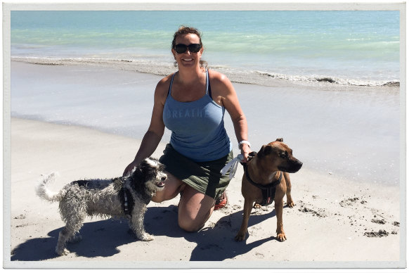 Gabrielle Targett, pictured here with her dogs Elliot and Tia, stood on a cobbler fish. "I wouldn't wish it on my worst enemy." 