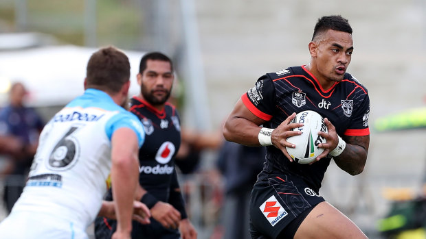 Making space: Ken Maumalo on the charge against the Titans.