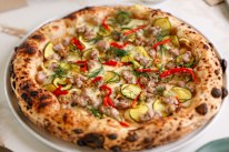 Pork and fennel sausage with fior di latte, zuni pickle and confit garlic.