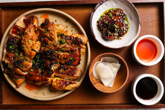 Chicken inasal is marinated in calamansi, ginger, garlic, lemongrass and spiced coconut vinegar.