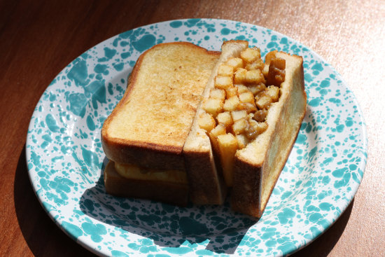 Chip butty with gravy sauce.