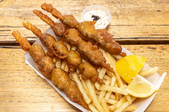 Skewers of fried mussels.