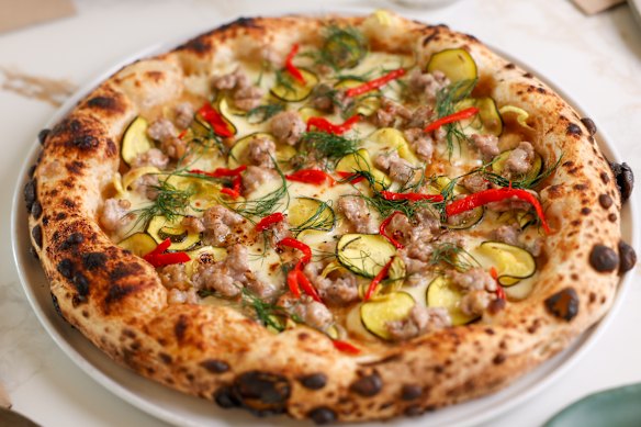 Pork and fennel sausage with fior di latte, zuni pickle and confit garlic.