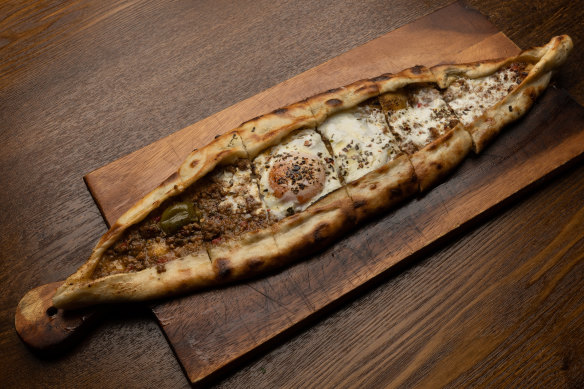 Take up the option to add an egg to the Kiymali pide.