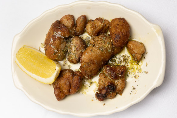 The go-to dish: sweetbreads served crisp on the outside, creamy in the middle, with lemon for squeezing.