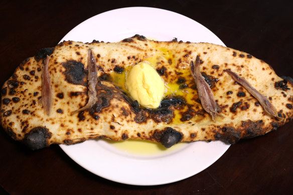 Wood-fired garlic flatbread.