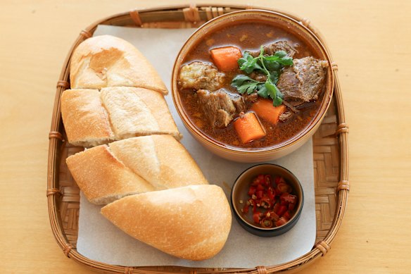 The Khor Kho slow-cooked beef rib stew comes with a side of bread for dipping.