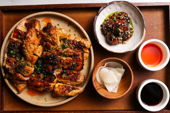 Chicken inasal is marinated in calamansi, ginger, garlic, lemongrass and spiced coconut vinegar.
