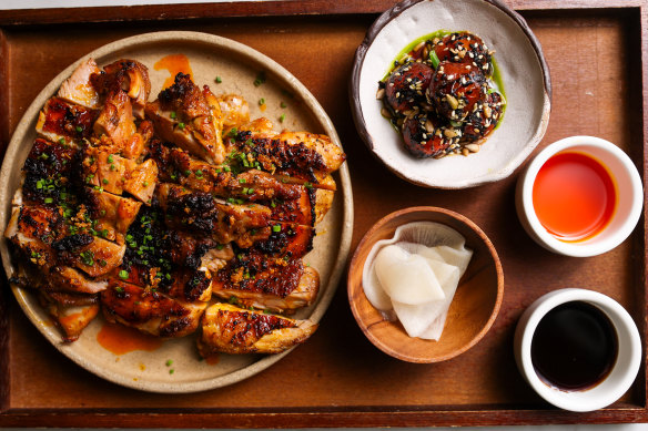 Chicken inasal is marinated in calamansi, ginger, garlic, lemongrass and spiced coconut vinegar.