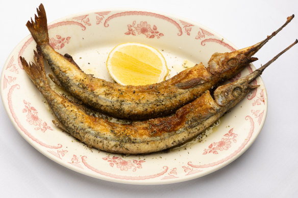 Fish of the day (whole garfish, on this occasion) is served with a lemon cheek.