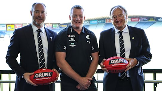 New order: Carlton senior coach Michael Voss (centre), president Luke Sayers (left) and CEO Brian Cook.