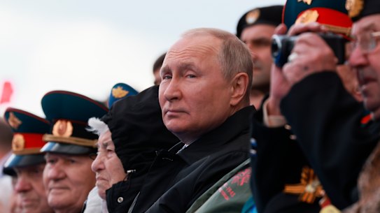 Russian President Vladimir Putin watches the Victory Day military parade in Moscow.