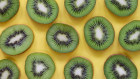 Kiwi fruits contain an enzyme that can aid digestion by helping to break down proteins.