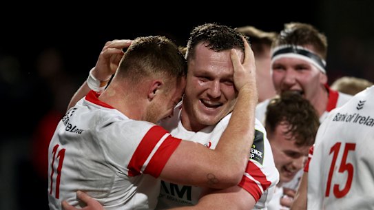 Angus Bell celebrates with Ulster teammates.