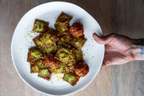 Spinach and ricotta ravioli with sugo and meatballs from Pasta et Al by Alec Morris.