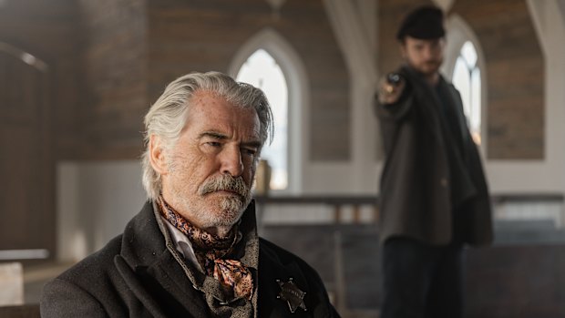 Pierce Brosnan, left, and Brandon Lessard in Richard Gray’s Western The Unholy Trinity.