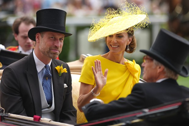 Kate, Princess of Wales and Prince William arrive in a carriage on the second day of the Royal Ascot