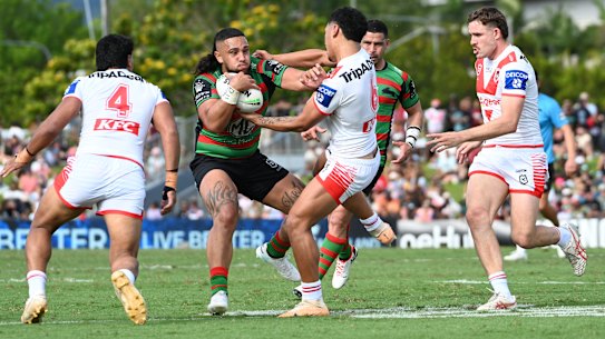 Keaon Koloamatangi takes on the Dragons defence in Cairns on Sunday.