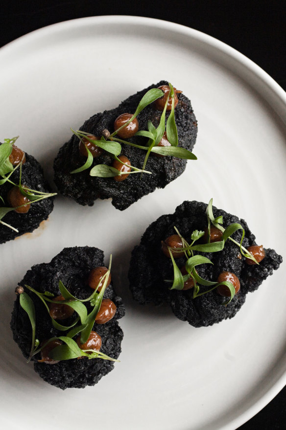 Fried chicken with ume and micro herbs.
