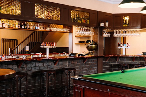 A pool table is part of the pub’s retro 1970s aesthetic.