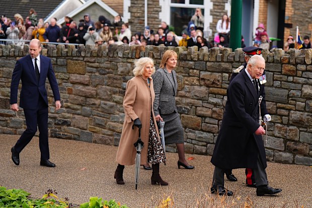King Charles III (R), Queen Camilla (C) and Prince William, Prince of Wales (L) arrive for a commemoration event at Aberfan Memorial Garden